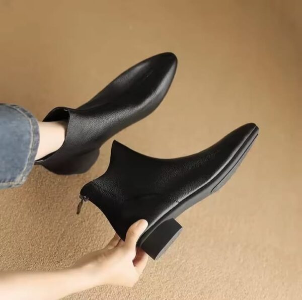 Elegant, vintage, soft, leather, comfortable, durable, stylish, warm, trendy, chic.